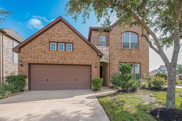 11023 Honey Suckle Haven Dr, Cypress, TX 77433 - traditional-style house featuring brick siding, driveway, and stone siding