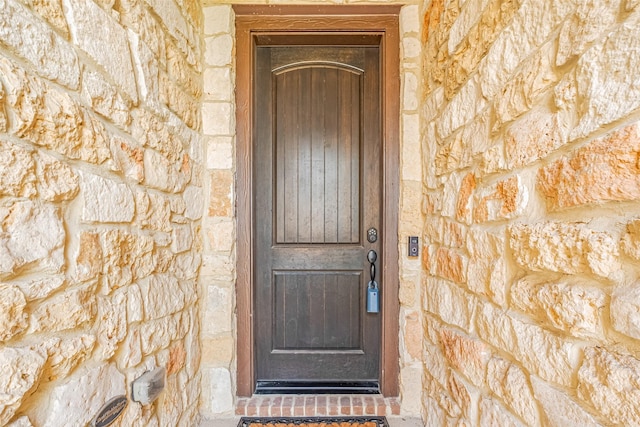 11023 Honey Suckle Haven Dr, Cypress, TX 77433 - doorway to property featuring stone siding