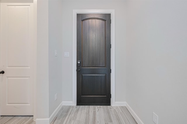 11023 Honey Suckle Haven Dr, Cypress, TX 77433 - entryway featuring baseboards and light wood-type flooring