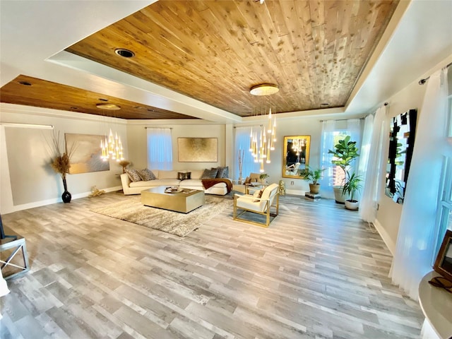 3359 Ozark St, Houston, TX 77021 - living area with wooden ceiling, a chandelier, a raised ceiling, and wood finished floors
