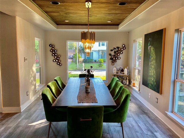 3359 Ozark St, Houston, TX 77021 - dining room featuring wooden ceiling, a tray ceiling, a chandelier, plenty of natural light, and recessed lighting