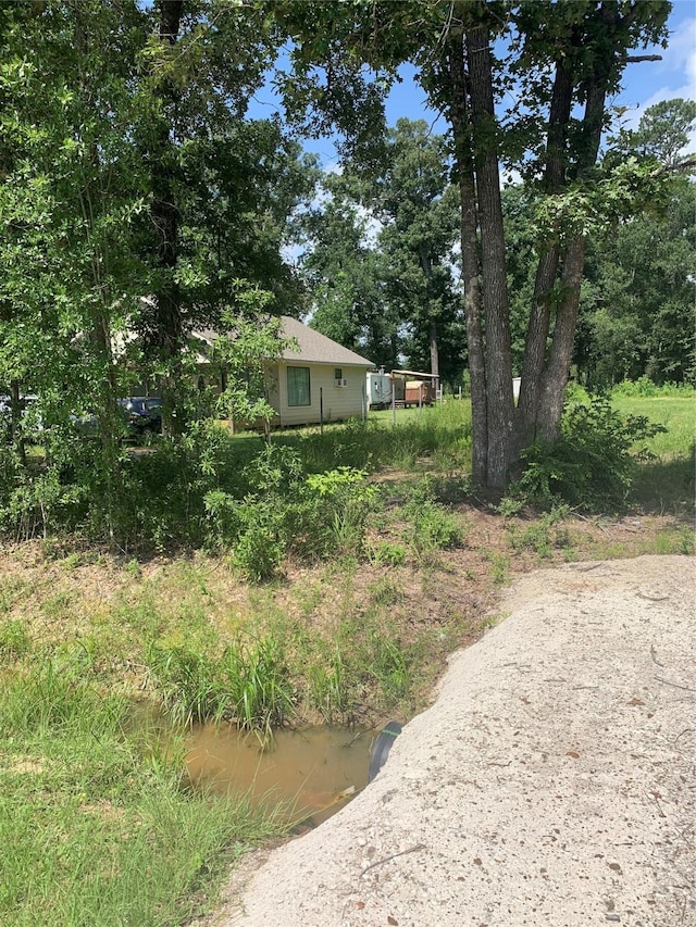 335 County Road 3662, Splendora, TX 77372