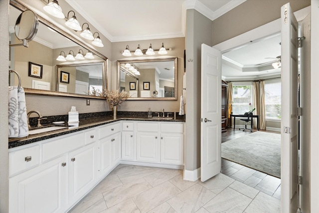 15410 Stable Star Cir, Cypress, TX 77429 - bathroom featuring double vanity, ornamental molding, ceiling fan, and marble look tile flooring