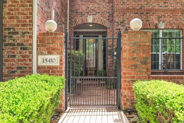 15410 Stable Star Cir, Cypress, TX 77429 - property entrance with brick siding and a gate