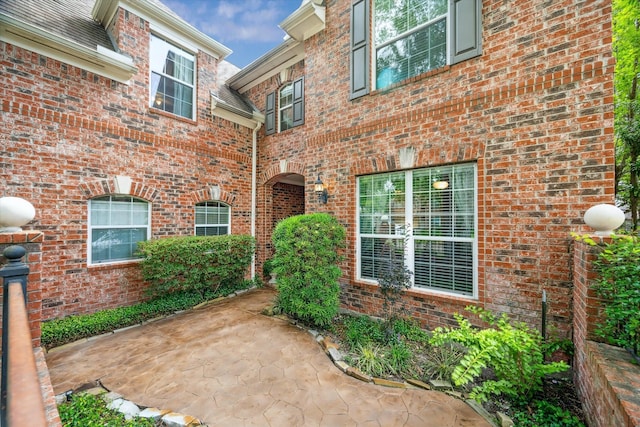15410 Stable Star Cir, Cypress, TX 77429 - view of exterior entry featuring a patio and brick siding