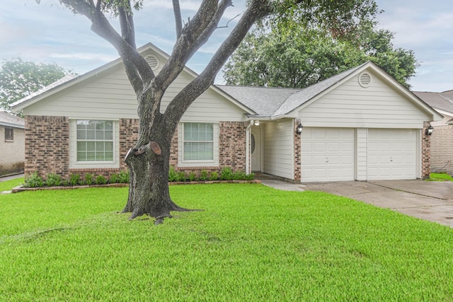 3805 Youpon Dr, La Porte, TX 77571 - view of front of home with a garage, brick siding, driveway, and a front yard