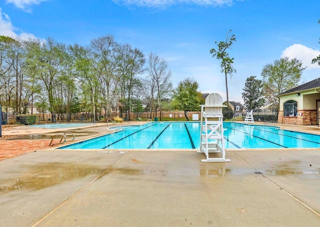 4311 Walden Terrace Ln, Humble, TX 77396 - community pool with a patio