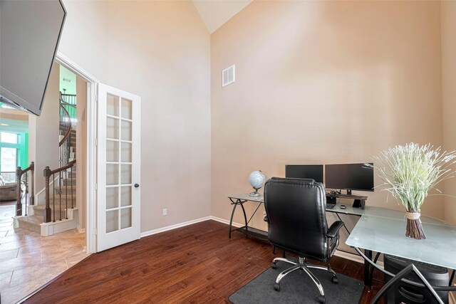 4311 Walden Terrace Ln, Humble, TX 77396 - office featuring high vaulted ceiling, wood finished floors, and french doors