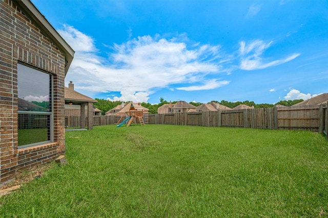 4311 Walden Terrace Ln, Humble, TX 77396 - fenced backyard featuring a playground