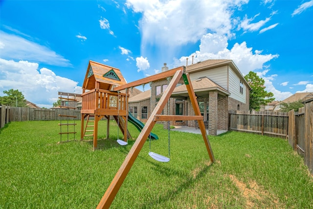 4311 Walden Terrace Ln, Humble, TX 77396 - view of play area featuring a fenced backyard, ceiling fan, and a patio