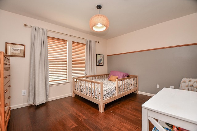2424 Charleston St Unit D, Houston, TX 77021 - bedroom with wood finished floors and baseboards