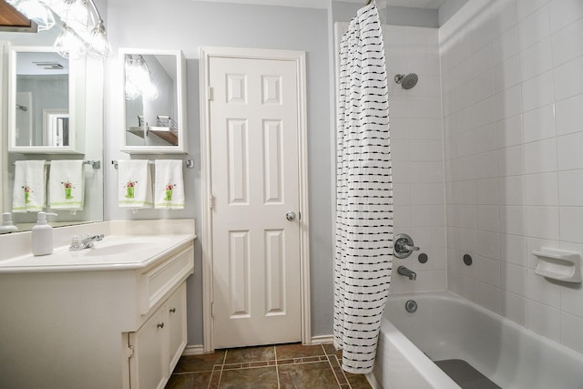 2424 Charleston St Unit D, Houston, TX 77021 - bathroom featuring shower / tub combo with curtain and vanity