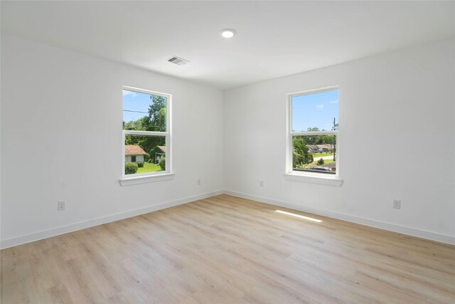 7504 Laura Koppe Rd C/D, Unit C/D Houston, TX 77028 - empty room with light wood-style floors and baseboards