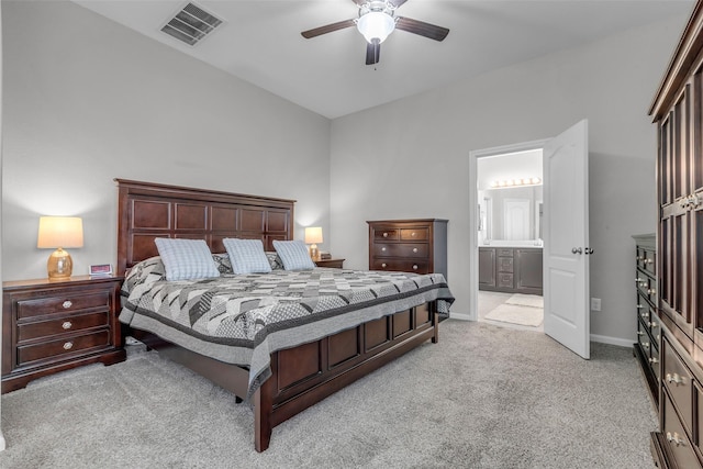 6423 Hunters Creek Ln, Baytown, TX 77521 - bedroom featuring light carpet, ensuite bath, and ceiling fan