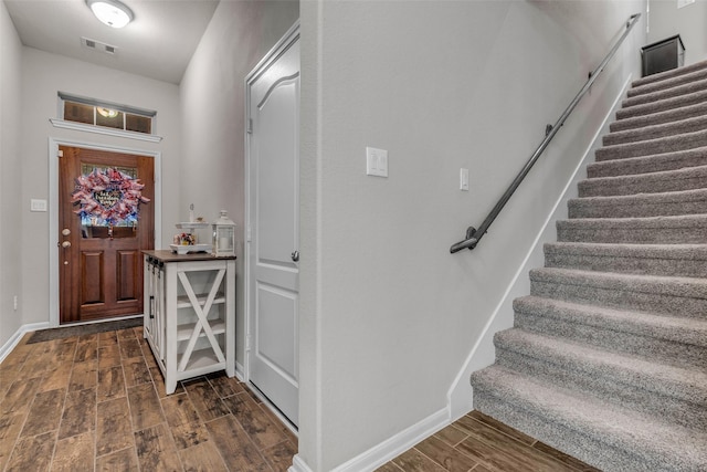 6423 Hunters Creek Ln, Baytown, TX 77521 - entrance foyer with dark wood finished floors and stairway