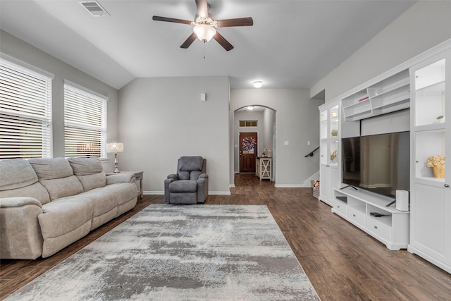 6423 Hunters Creek Ln, Baytown, TX 77521 - living room with arched walkways, a ceiling fan, dark wood-type flooring, and lofted ceiling