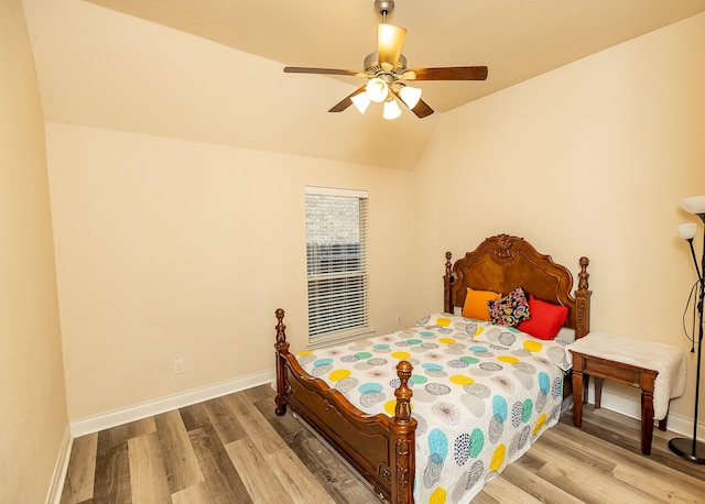 4015 Teramo Ln, Katy, TX 77493 - bedroom featuring wood finished floors, vaulted ceiling, and a ceiling fan