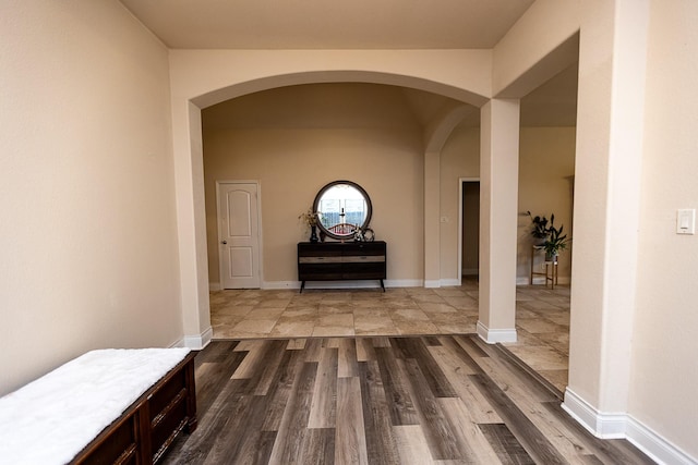 4015 Teramo Ln, Katy, TX 77493 - hall featuring arched walkways and dark wood-style flooring