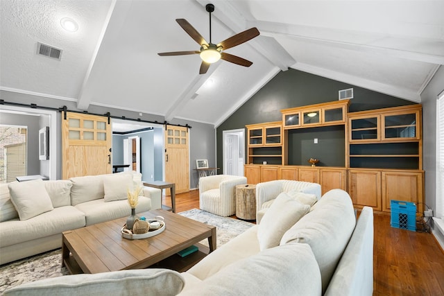 6702 Seinfeld Ct, Houston, TX 77069 - living room with a barn door, wood finished floors, and ceiling fan