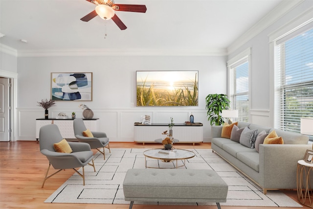 2802 Morrison St Unit 203, Houston, TX 77009 - living room with light wood finished floors, crown molding, ceiling fan, a decorative wall, and radiator heating unit