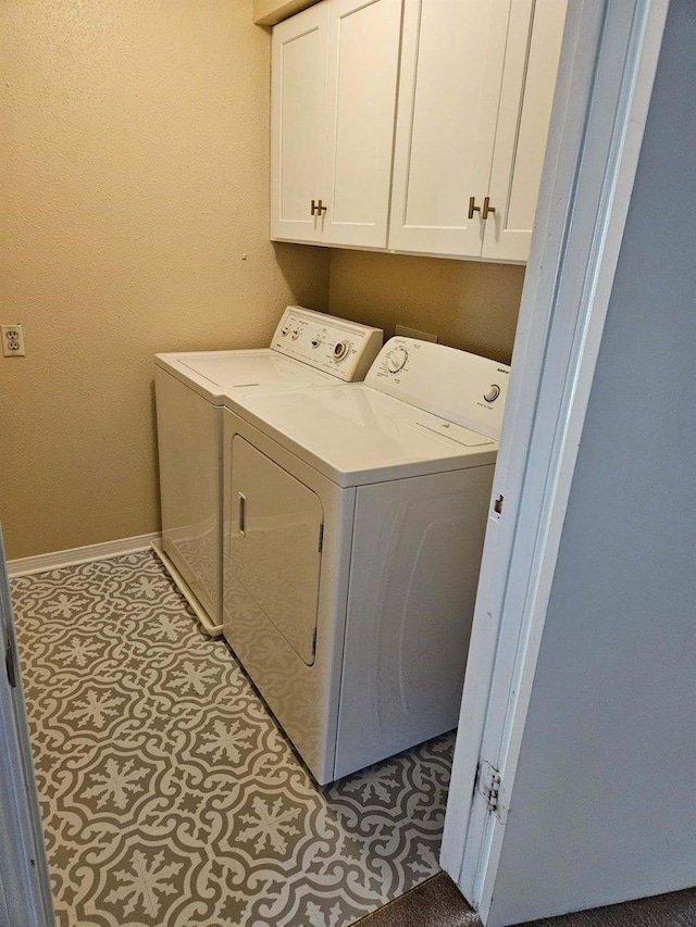 1112 Bering Dr Unit 47, Houston, TX 77057 - laundry area featuring washer and clothes dryer and cabinet space