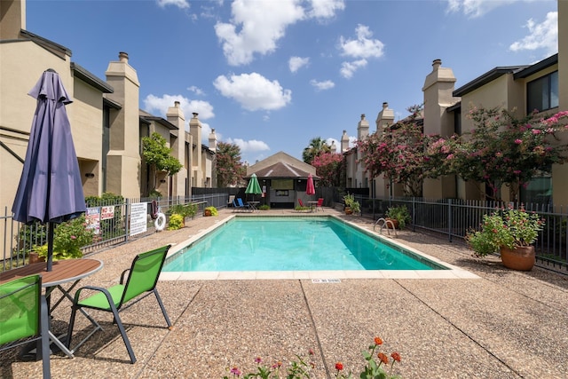 1112 Bering Dr Unit 47, Houston, TX 77057 - community pool featuring a patio area and a residential view