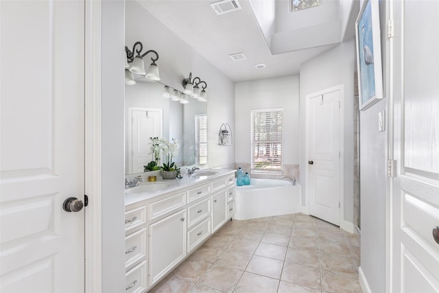 1018 N Commons View Dr, Houston, TX 77336 - bathroom featuring double vanity, a garden tub, and tile patterned flooring