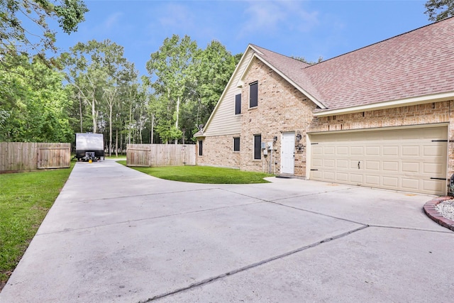 1018 N Commons View Dr, Houston, TX 77336 - view of property exterior with driveway, brick siding, and roof with shingles