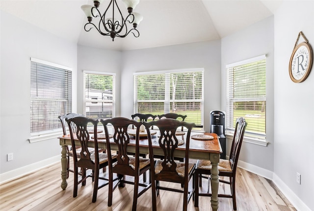 1018 N Commons View Dr, Houston, TX 77336 - dining room with a chandelier and light wood-style flooring