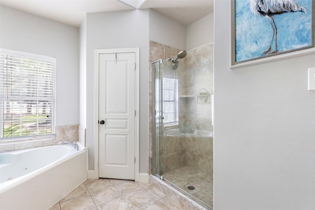 1018 N Commons View Dr, Houston, TX 77336 - bathroom featuring a shower stall, tile patterned flooring, a jetted tub, and healthy amount of natural light