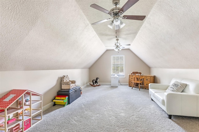 1018 N Commons View Dr, Houston, TX 77336 - sitting room featuring a textured ceiling, carpet flooring, a ceiling fan, and vaulted ceiling
