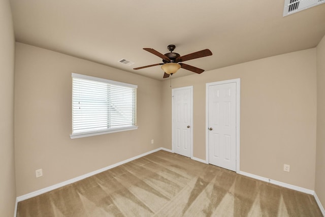 9119 Basin Ridge Ln, Richmond, TX 77407 - unfurnished bedroom featuring carpet floors and ceiling fan