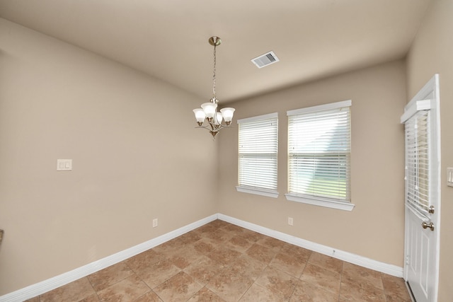 9119 Basin Ridge Ln, Richmond, TX 77407 - unfurnished room with a chandelier and baseboards