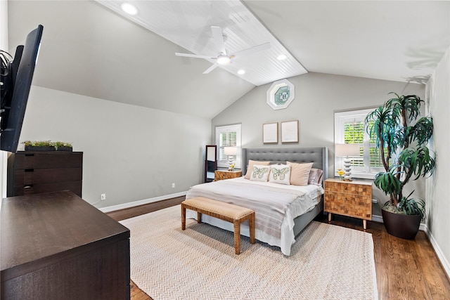 5617 Valerie St, Houston, TX 77081 - bedroom with vaulted ceiling, wood finished floors, multiple windows, recessed lighting, and ceiling fan