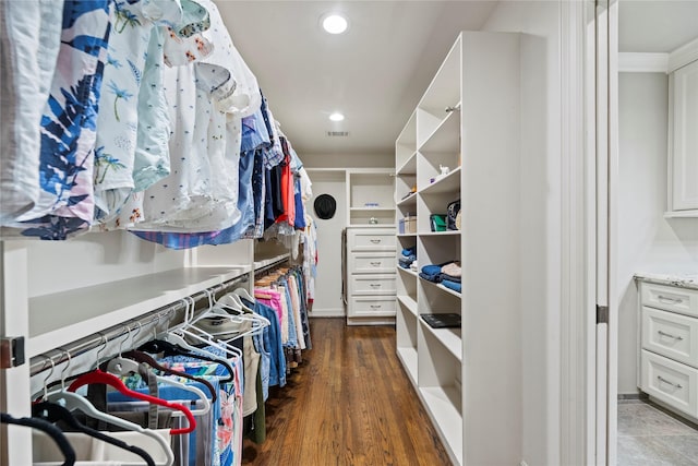 5617 Valerie St, Houston, TX 77081 - walk in closet with wood finished floors