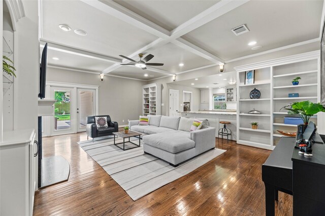 5617 Valerie St, Houston, TX 77081 - living room featuring dark wood finished floors, a ceiling fan, recessed lighting, beam ceiling, and coffered ceiling