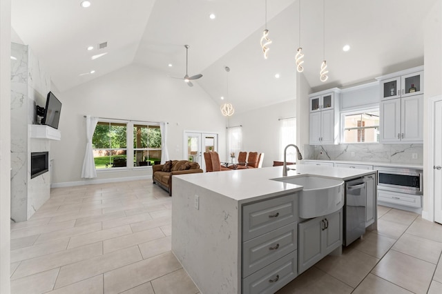 532 Carrell St, Tomball, TX 77375 - kitchen with appliances with stainless steel finishes, an island with sink, light countertops, open floor plan, and recessed lighting