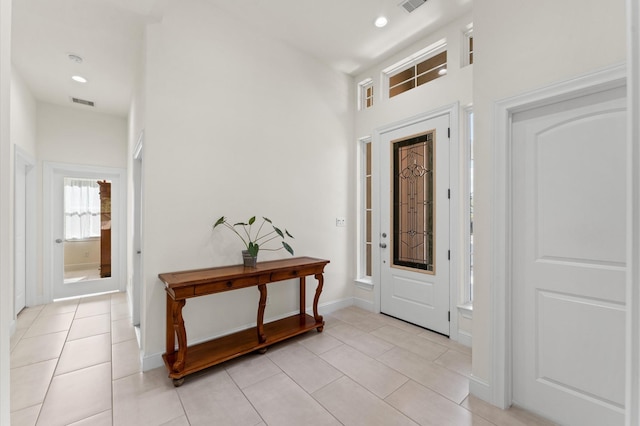 532 Carrell St, Tomball, TX 77375 - foyer featuring light tile patterned floors and recessed lighting