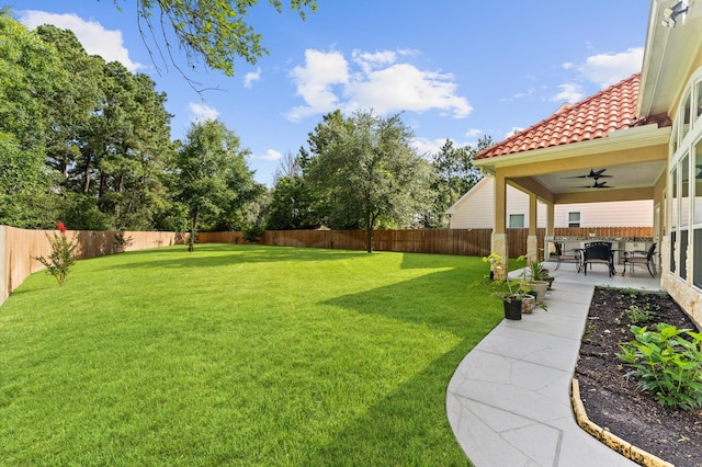 532 Carrell St, Tomball, TX 77375 - fenced backyard featuring a ceiling fan and a patio