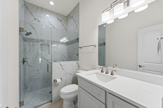 532 Carrell St, Tomball, TX 77375 - bathroom with a marble finish shower, vanity, and recessed lighting