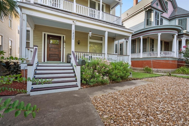 1820 Winnie St, Galveston, TX 77550 - doorway to property with a porch