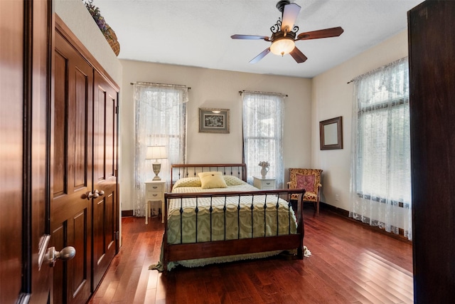 1820 Winnie St, Galveston, TX 77550 - bedroom featuring dark wood-style floors, ceiling fan, and a closet
