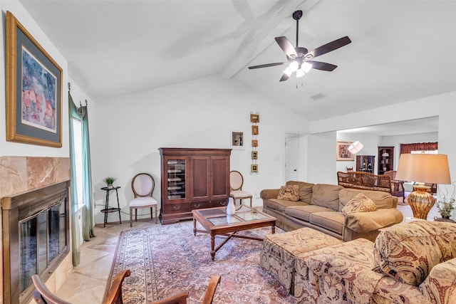 16622 Ben Nevis Dr, Houston, TX 77084 - living area featuring beamed ceiling, a premium fireplace, ceiling fan, and high vaulted ceiling