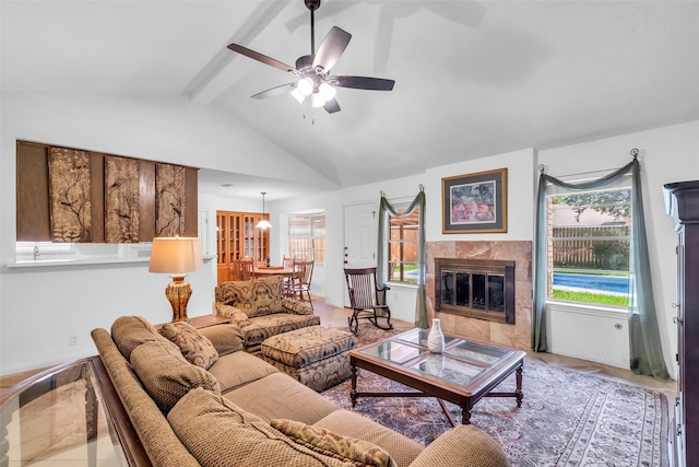 16622 Ben Nevis Dr, Houston, TX 77084 - living room with a ceiling fan, healthy amount of natural light, and a fireplace