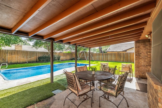16622 Ben Nevis Dr, Houston, TX 77084 - fenced backyard with outdoor dining space and a patio