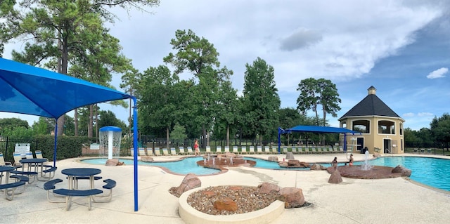 13506 Key Ridge Ln, Cypress, TX 77429 - community pool with a patio and view of wooded area