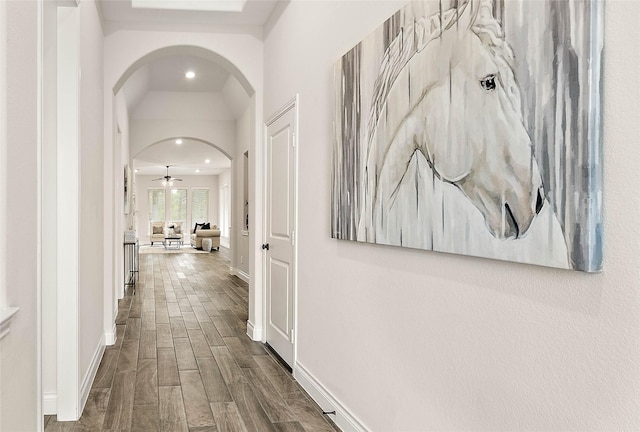 19002 Dublin Bay Blvd, Tomball, TX 77377 - hall with arched walkways, dark wood finished floors, and recessed lighting