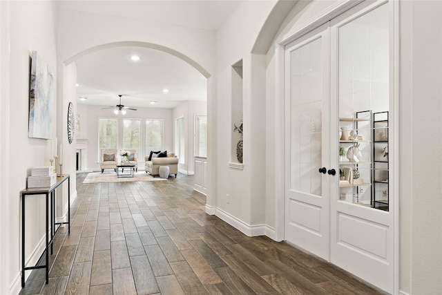 19002 Dublin Bay Blvd, Tomball, TX 77377 - foyer with arched walkways, dark wood-type flooring, ceiling fan, and recessed lighting