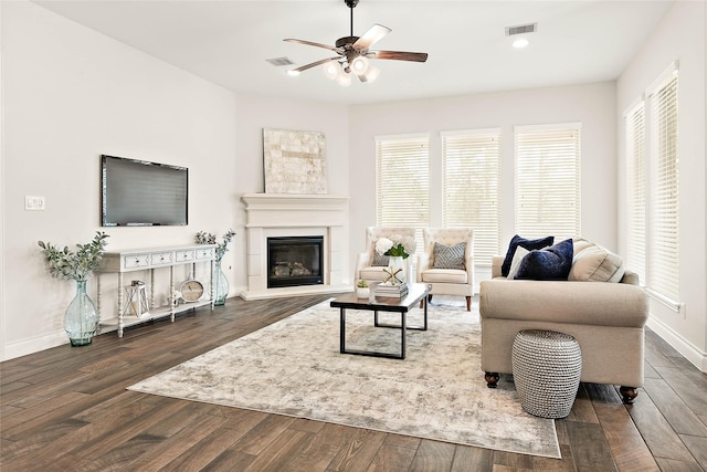 19002 Dublin Bay Blvd, Tomball, TX 77377 - living area with a ceiling fan, wood finished floors, a glass covered fireplace, and recessed lighting