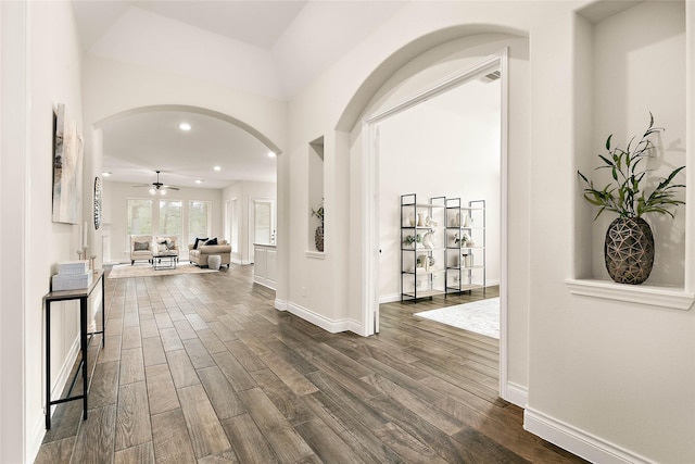 19002 Dublin Bay Blvd, Tomball, TX 77377 - hallway featuring arched walkways, dark wood-type flooring, and recessed lighting